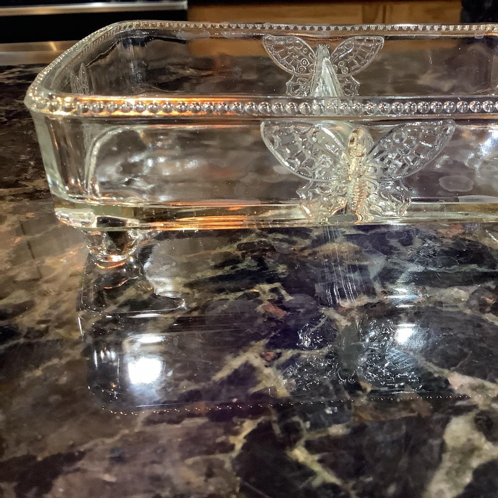 Clear Glass Butterfly Trinket Dish 2” high 6” across . Clear vintage.